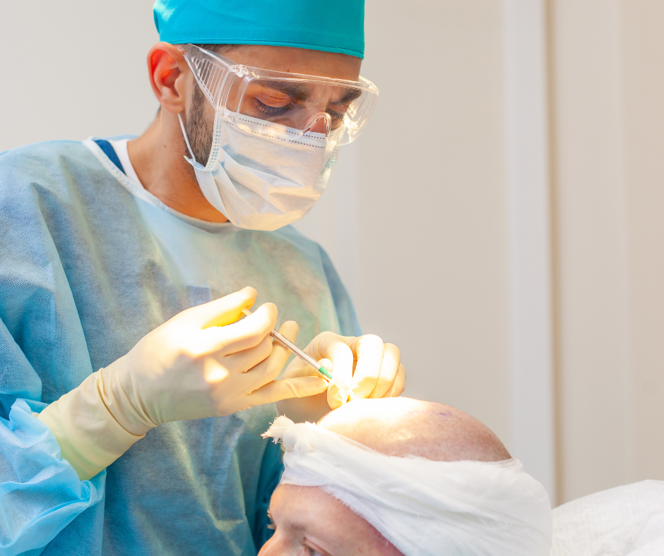 Hair restoration surgery cost explained: surgeon performing a hair transplant